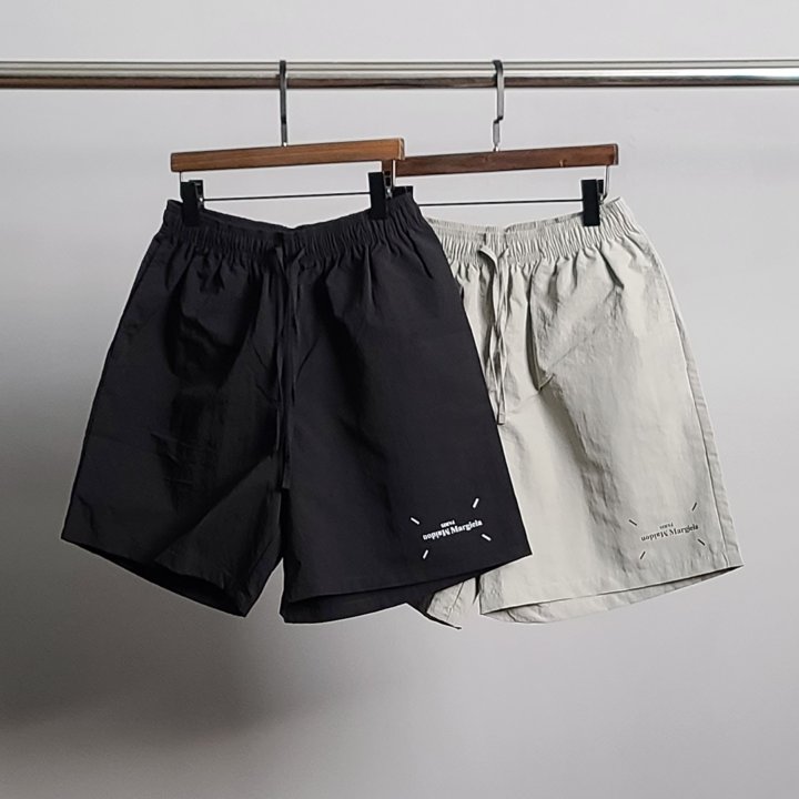 ●5월 판매 9위● MAISON MARGIELA 메종마르지엘라 레터링 프린팅 나일론 5부 팬츠